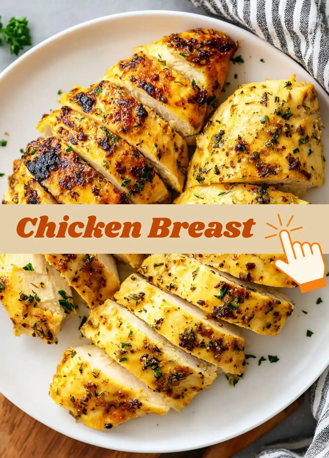 Sliced juicy grilled chicken breast on a white plate with herbs