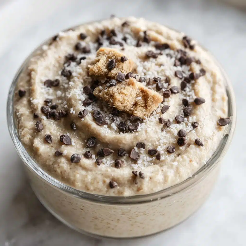 High protein cookie dough overnight oats topped with chocolate chips and cookie crumbles